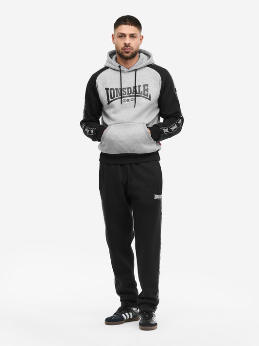 Schwarz-grauer Lonsdale Herren Jogginganzug: Kapuzensweatshirt mit Logo-Print und passender Hose, normale Passform.