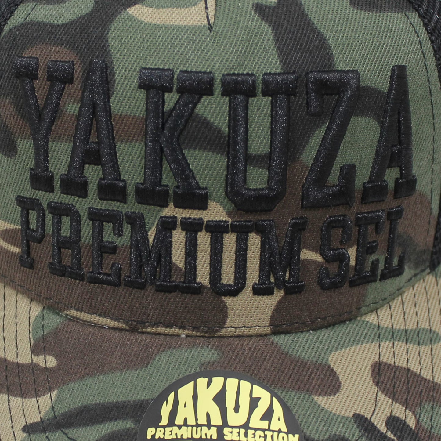 Yakuza Premium Base Cap – Snapback stylisches, camo Cap mit hochwertigem Stick-Design. Perfekt für trendbewusste Streetwear-Fans. Robuste Verarbeitung und unverwechselbares Yakuza-Logo für den ultimativen Look. Ideal für jedes Casual-Outfit Snapback