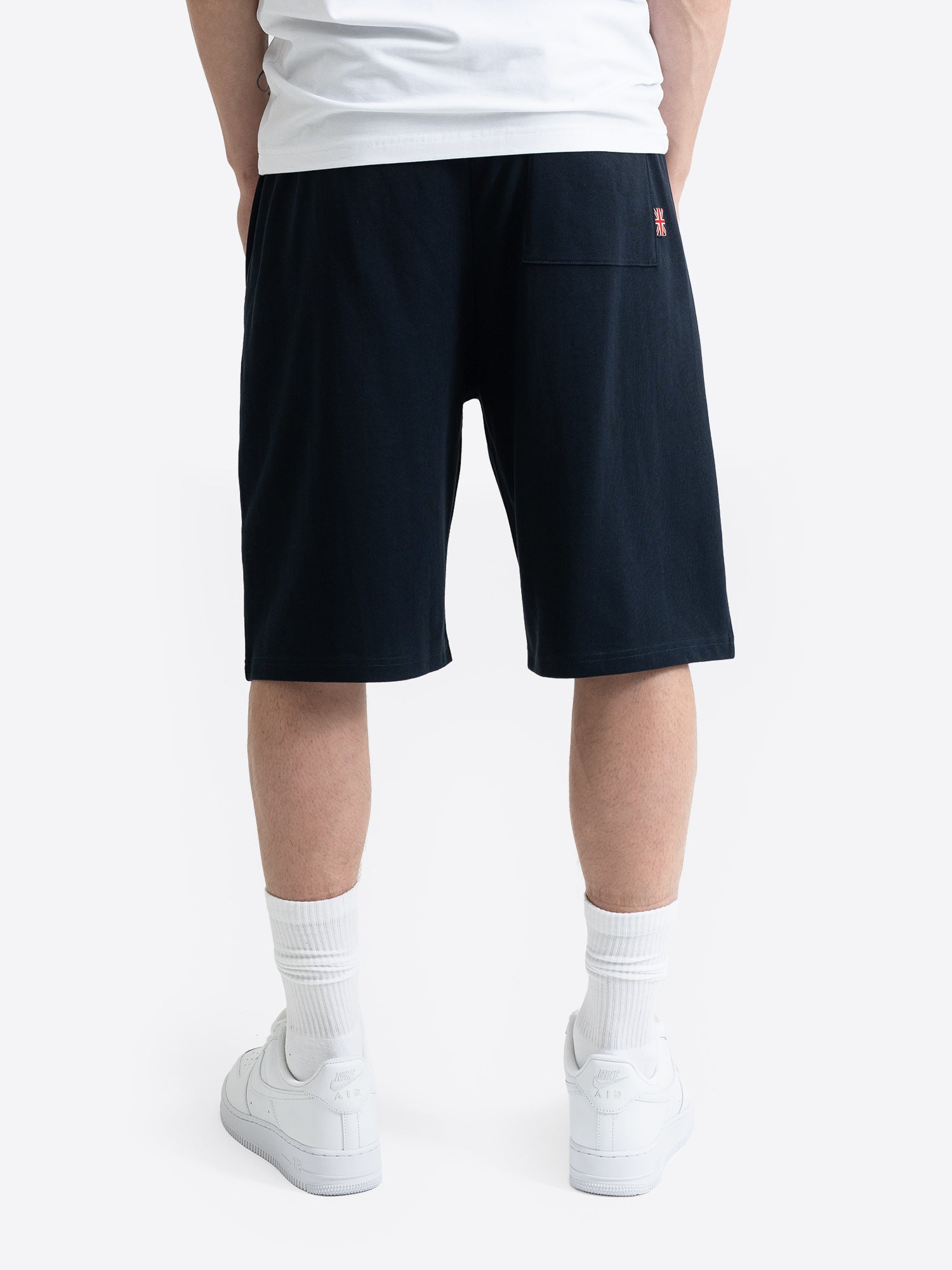 Rückansicht der Lonsdale Herren-Shorts in Dark Navy mit einer aufgesetzten Tasche.