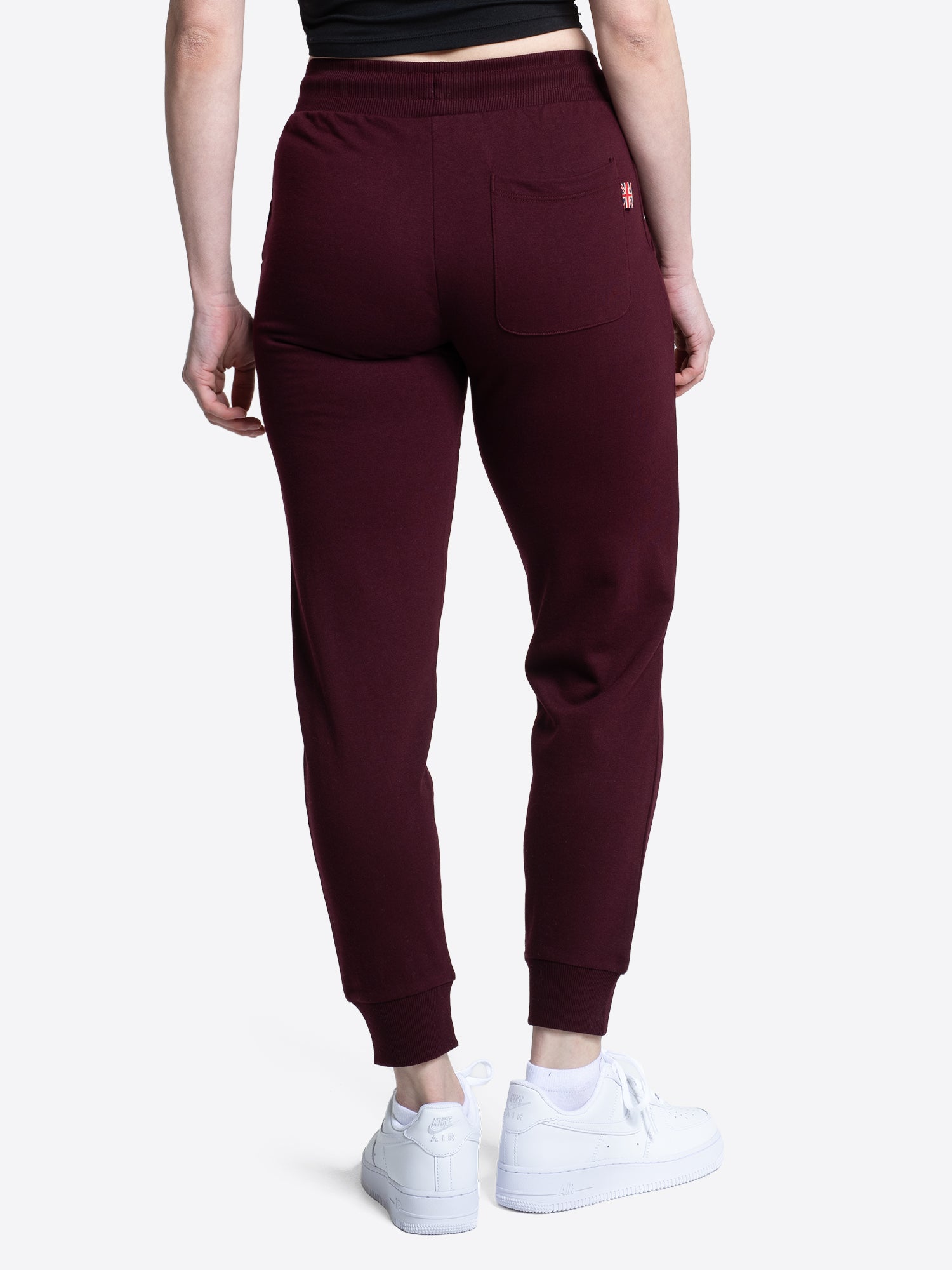 Rückansicht der Lonsdale Damen-Trainerhose in Chalk mit elastischem Bund.