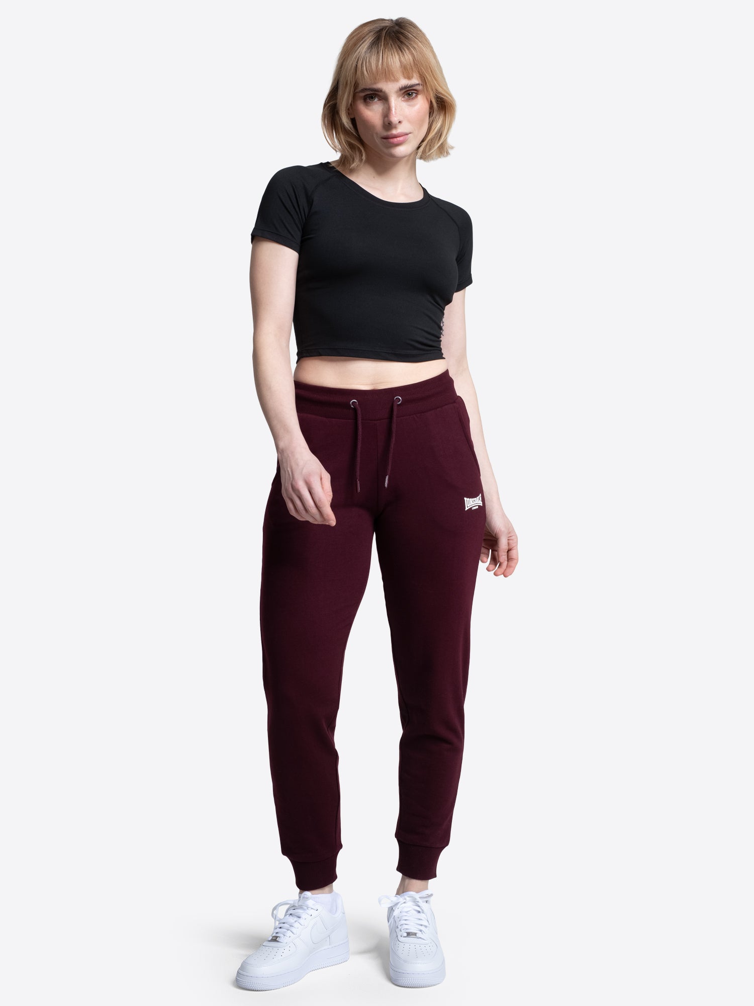 Lonsdale Damen-Jogginghose Oxblood mit chalk Logo-Druck und Kordelzug.