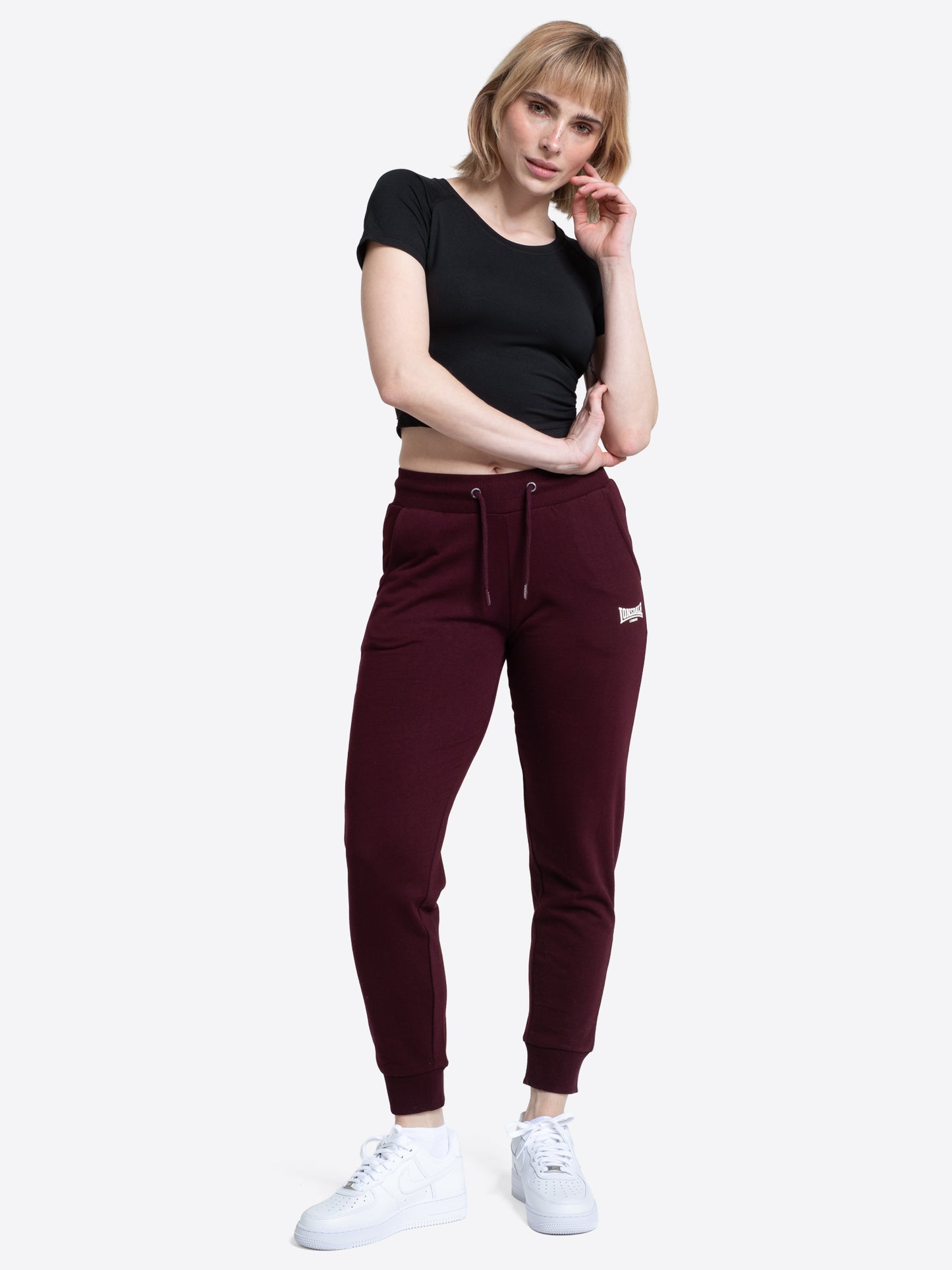 Lonsdale Damen-Jogginghose Oxblood mit chalk Logo-Druck und Kordelzug.
