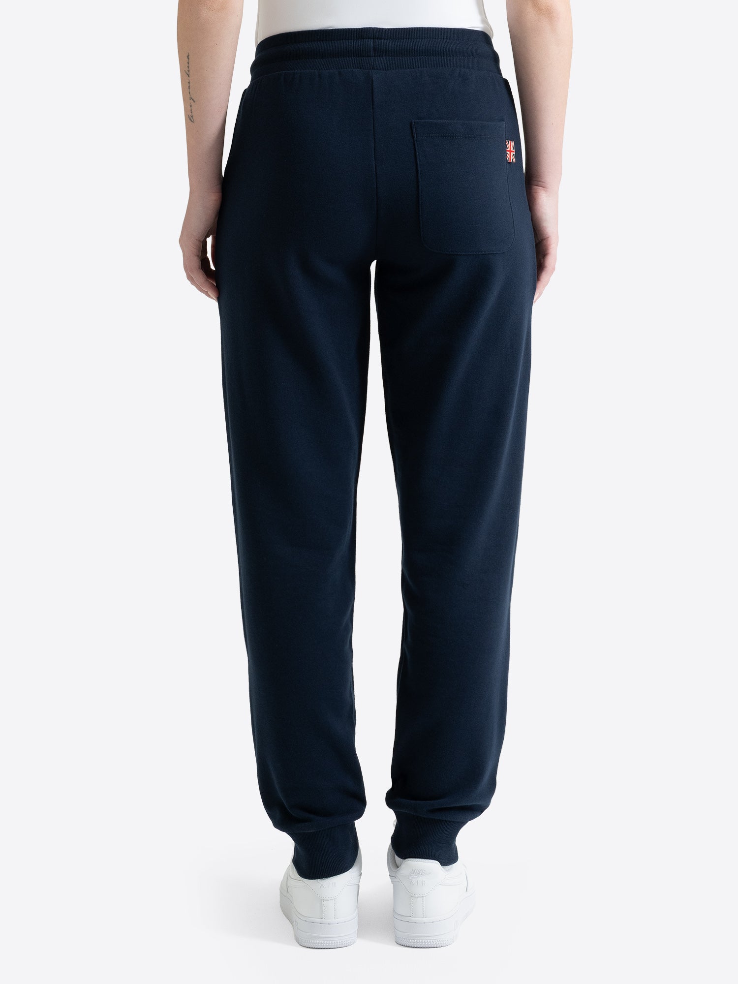 Rückansicht der Lonsdale Damen-Trainerhose in Navy mit elastischem Bund.