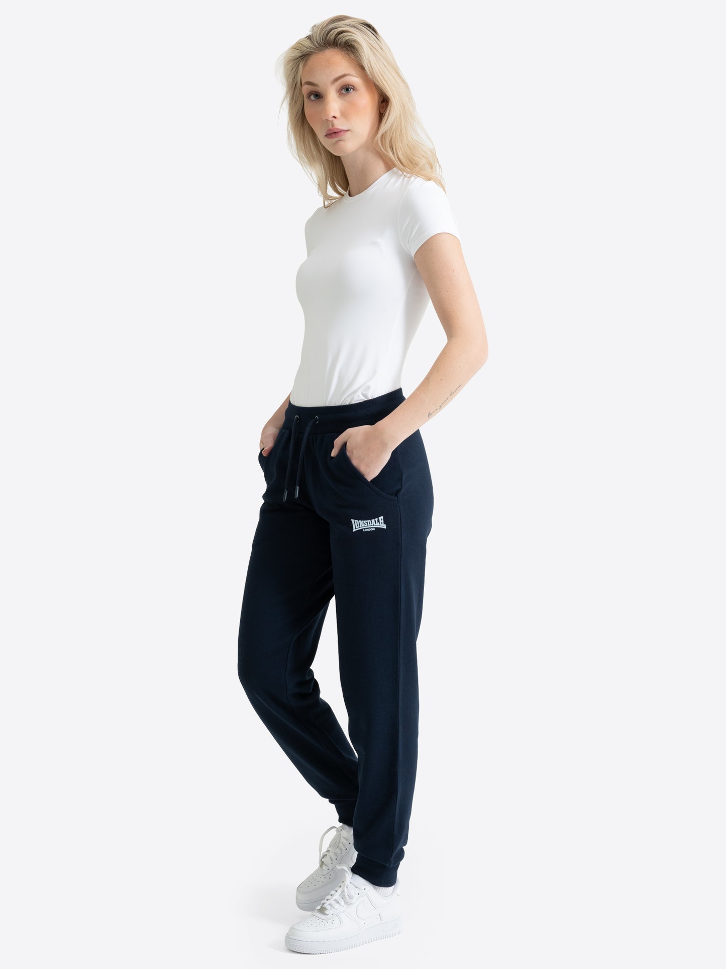  Lonsdale Damen-Jogginghose Navy mit weissem Logo-Druck und Kordelzug.