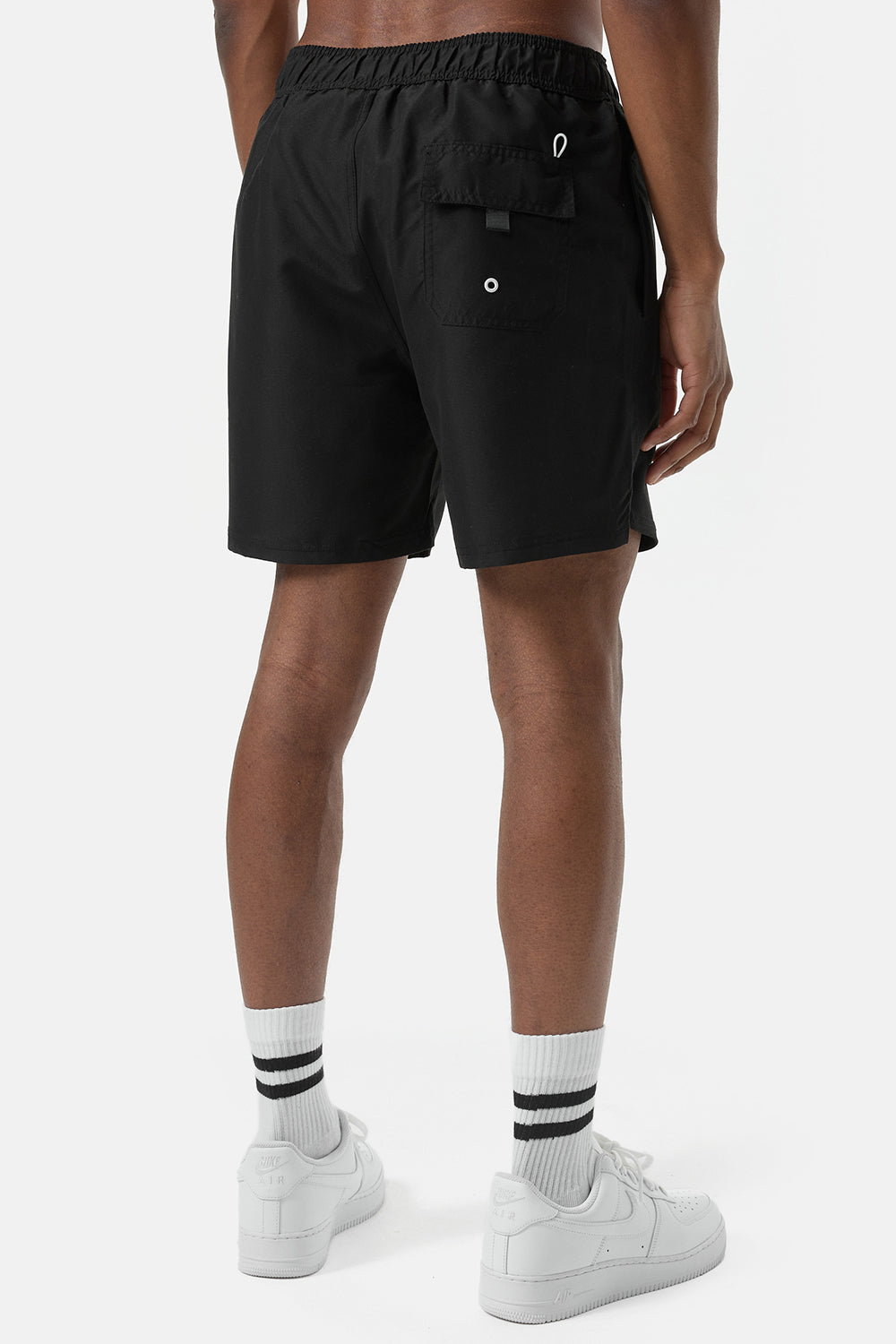 Schwarze Lonsdale Herren Beachshorts normale Passform mit Streifen und Logo am linken Bein