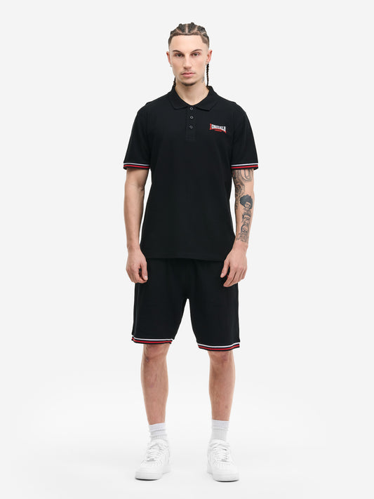 Schwarzes Lonsdale Herren-Set: Poloshirt aus Piqué und Jersey-Shorts, normale Passform, farblich abgesetzte Bündchen.