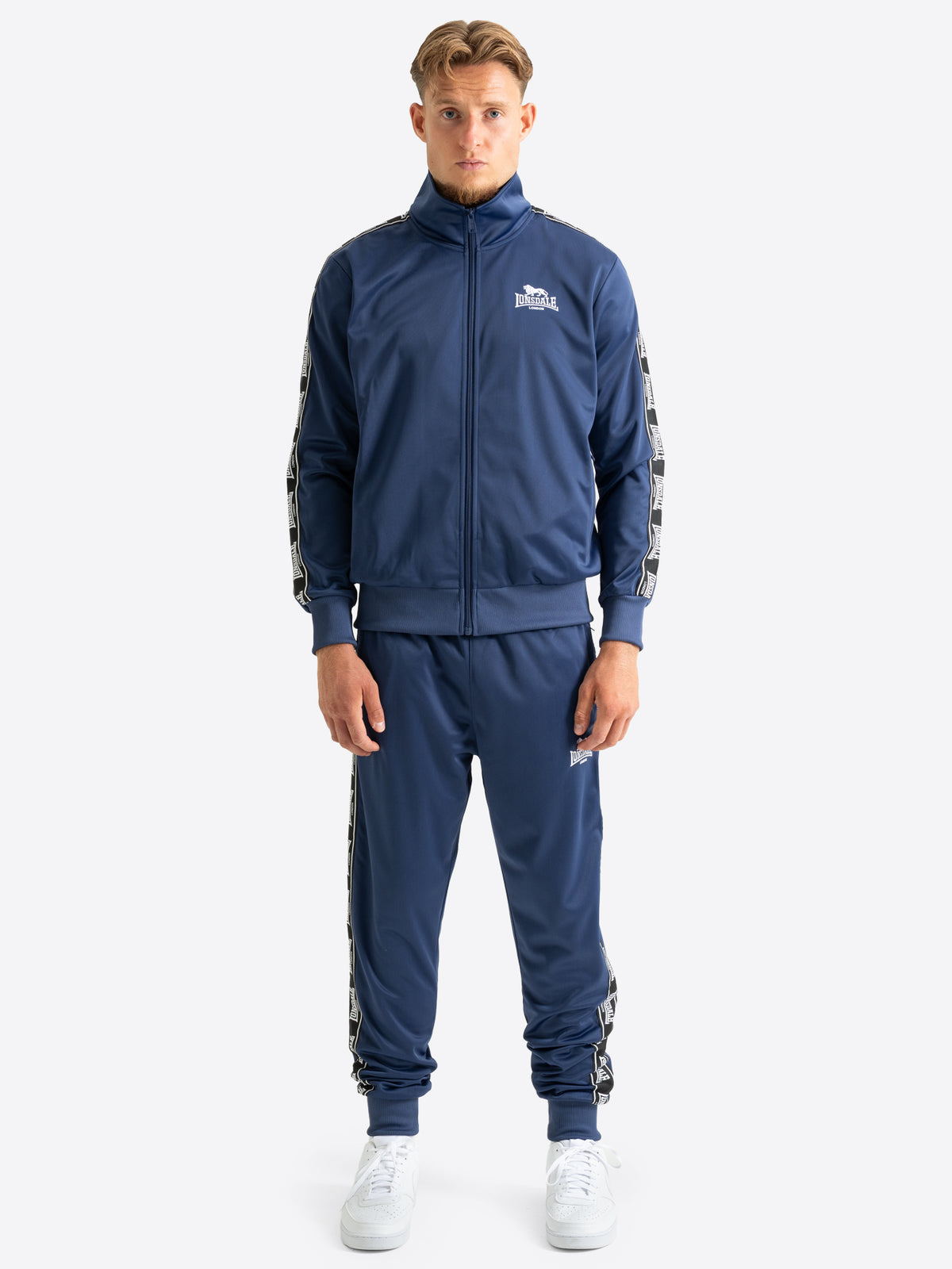Lonsdale Herren Jogginganzug in Navy-Blau aus Trikot-Fleece mit Logo-Webband.