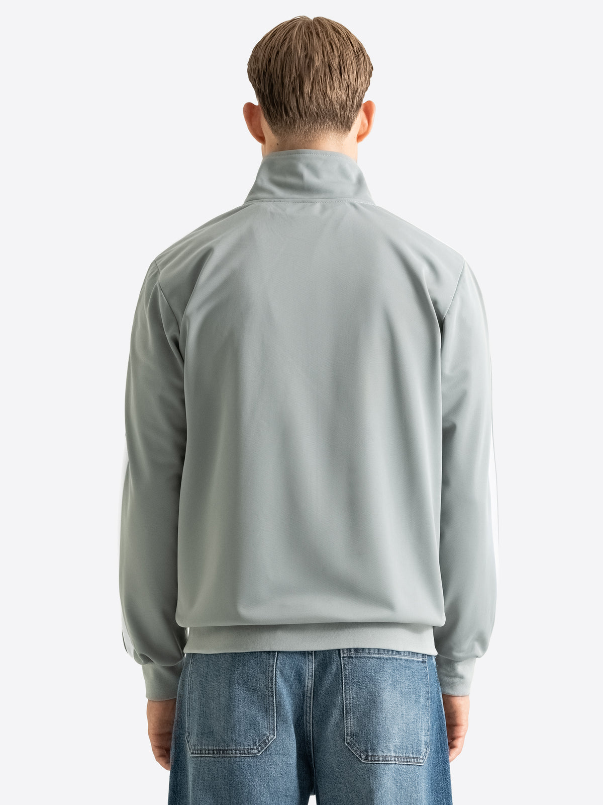 Rückansicht der grauen Lonsdale Herren Trainingsjacke