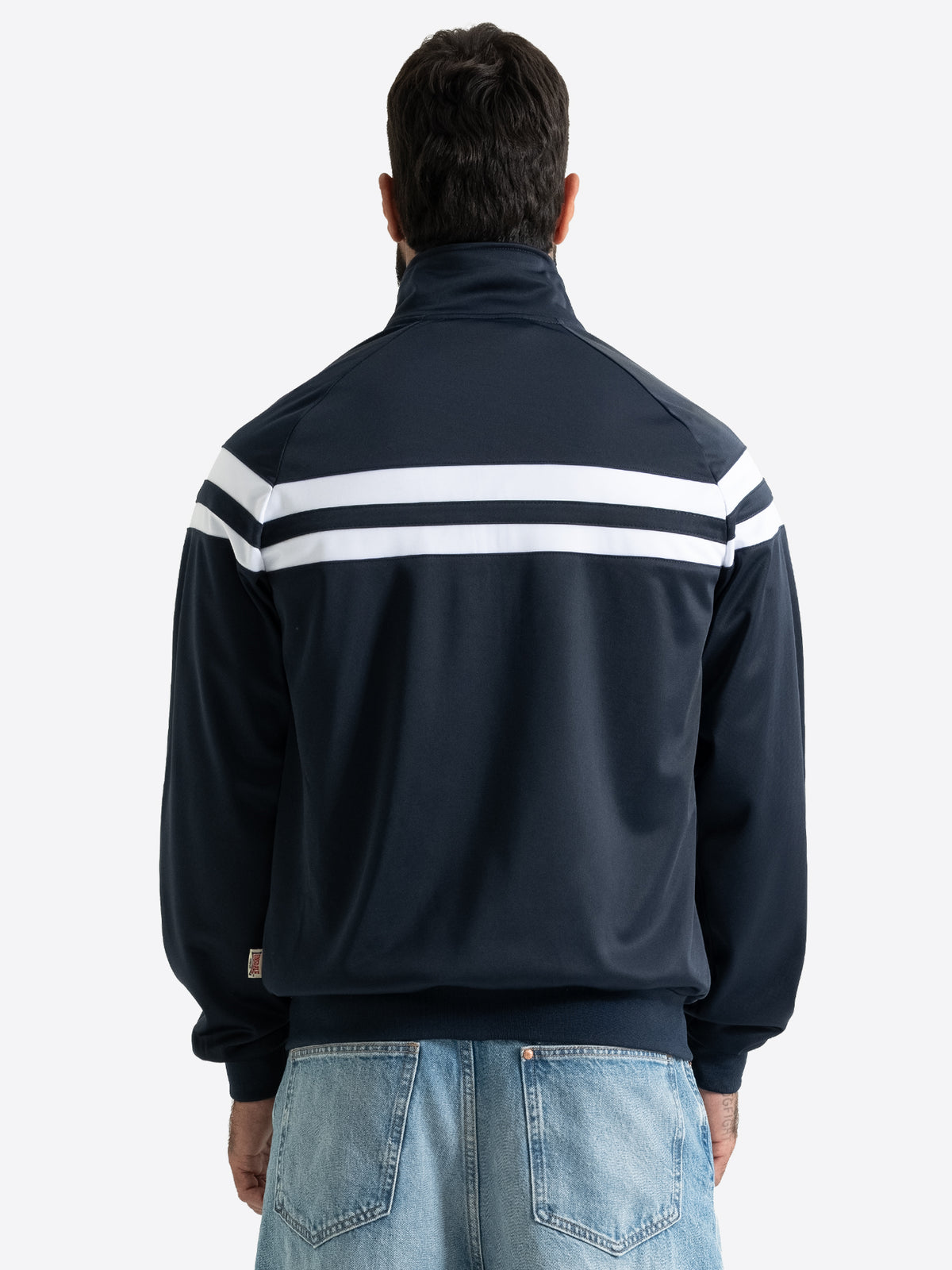 Rückansicht der Lonsdale Herren-Trainingsjacke in Dark Navy mit Raglanärmeln und durchgehenden weissen Kontraststreifen.
