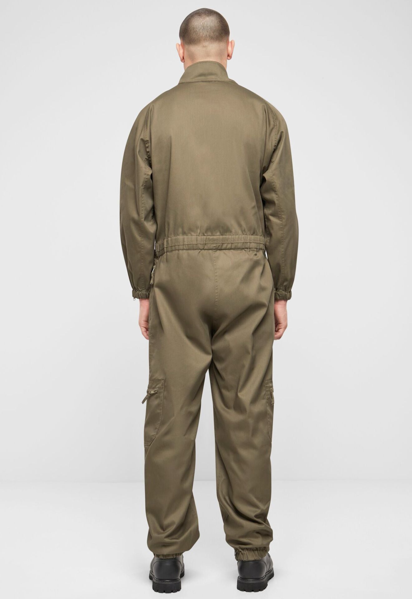Rückansicht Brandit Flight Suit Kombi-Overall in Olive mit elastischem Gummizug in der Taille.