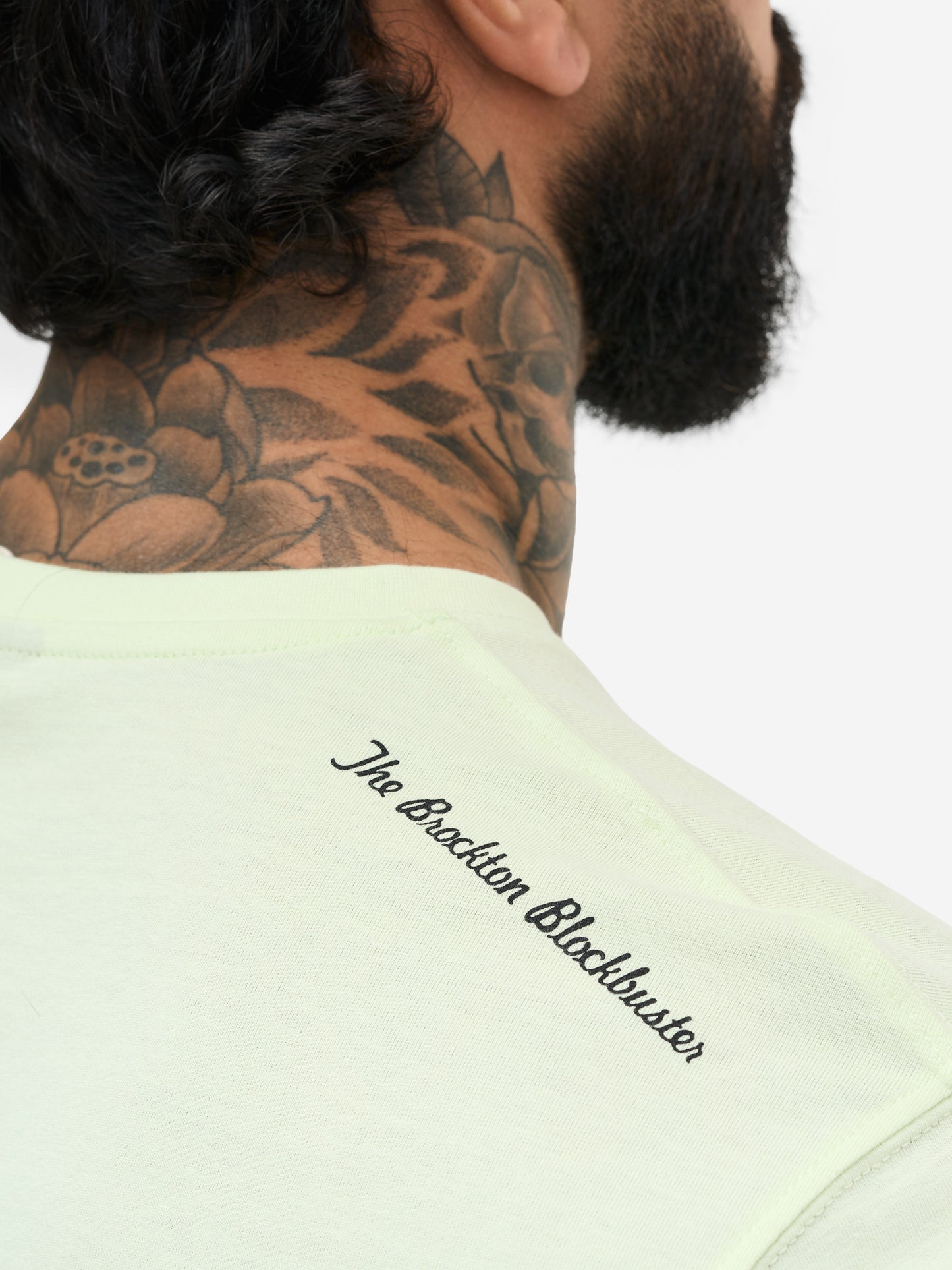 The Brockton Blockbuster' Print auf der Schulter des hellgrünen Benlee Shirts