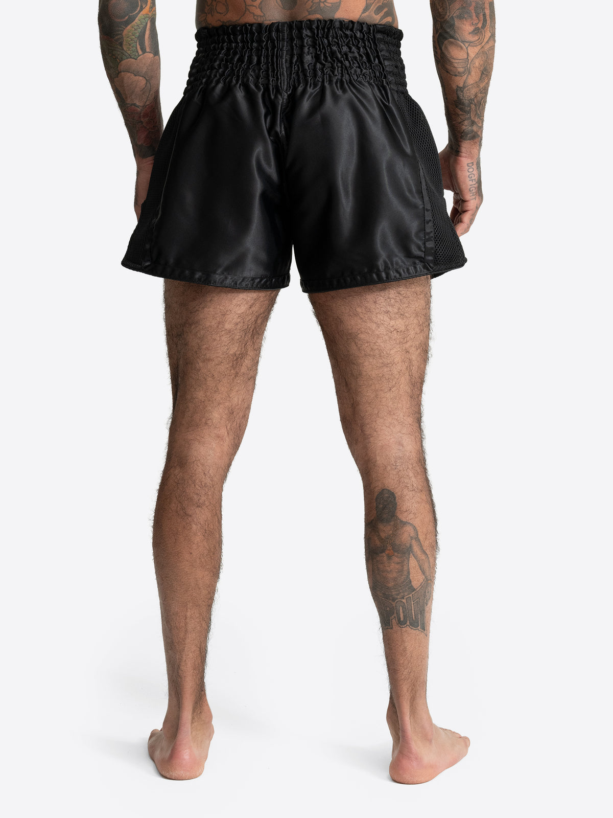 Rückansicht der schwarz-weissen BENLEE Unisex Thaibox-Hose aus Satin