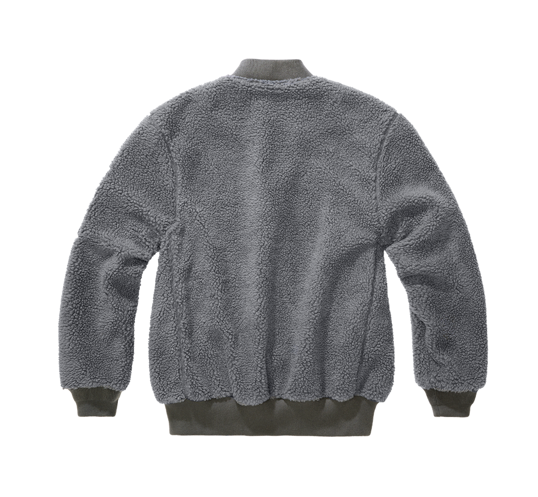 Brandit Teddyfleece-Bomberjacke in Anthra mit Strickbund, zwei Einschubtaschen und Oberarmtasche mit Reissverschluss.