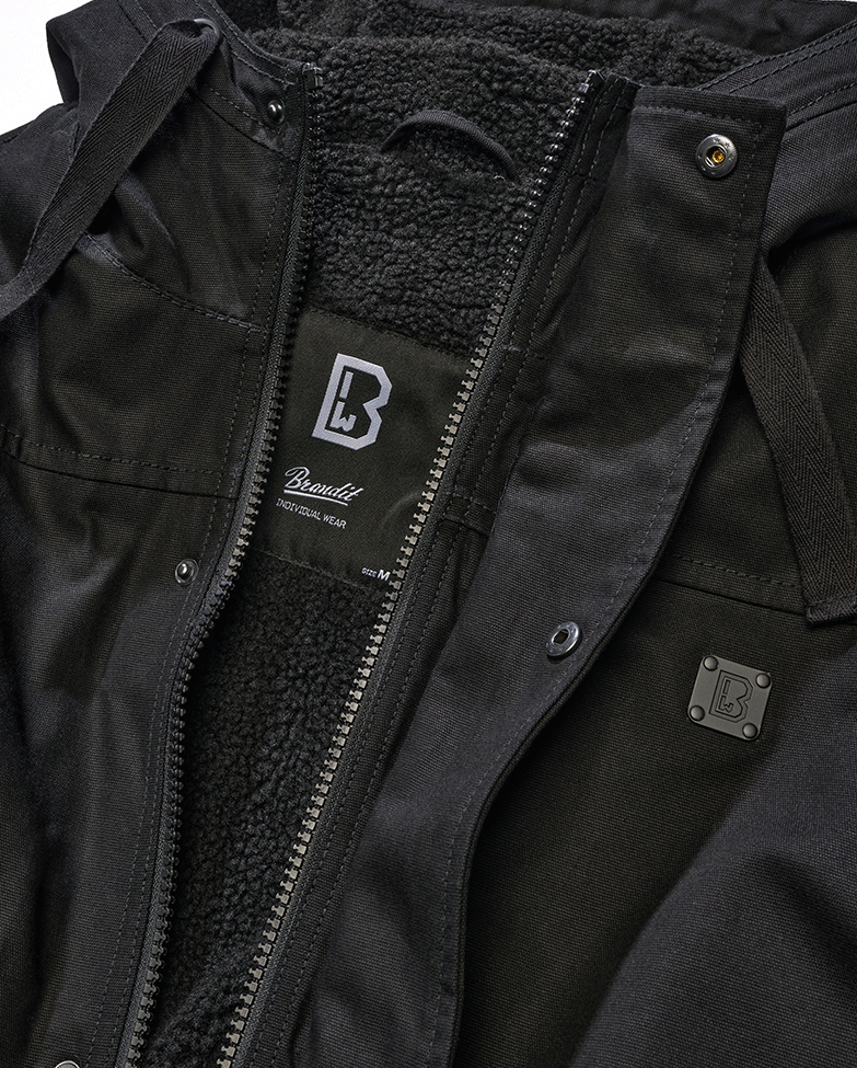 Brandit Kurzjacke in Schwarz – robustes Canvas, Kapuze mit Kordelzug, Teddyfellfutter und praktische Taschen für stylischen Komfort