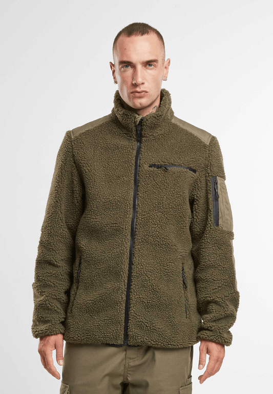 Brandit Teddyfleece-Jacke Oliv mit Ripstop-Einsätzen, Reißverschlusstaschen und atmungsaktivem Meshfutter.