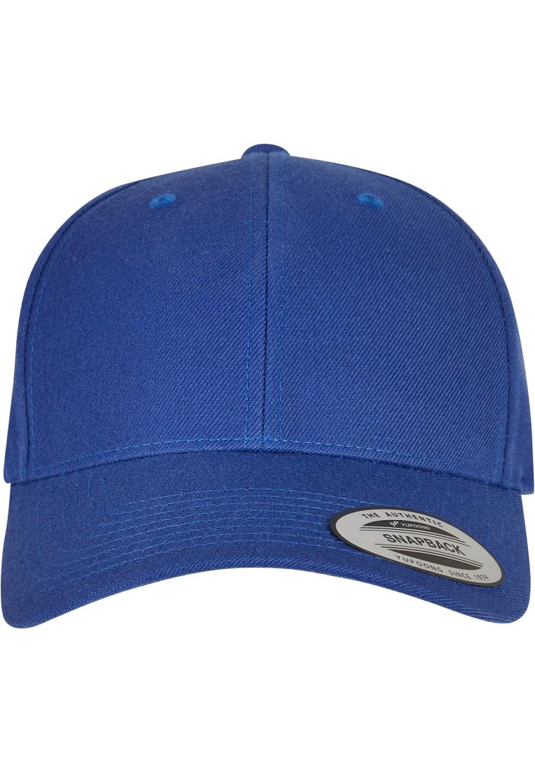 Premium Snapback Cap von Flexfit in Royalblau mit gebogenem Schirm aus Wolle und Acryl.