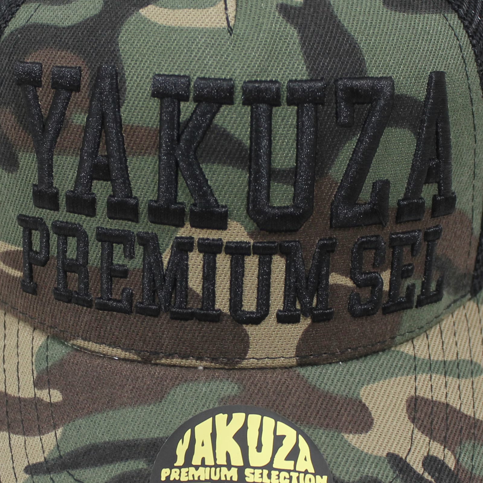 Yakuza Premium Base Cap – Snapback stylisches, camo Cap mit hochwertigem Stick-Design. Perfekt für trendbewusste Streetwear-Fans. Robuste Verarbeitung und unverwechselbares Yakuza-Logo für den ultimativen Look. Ideal für jedes Casual-Outfit Snapback
